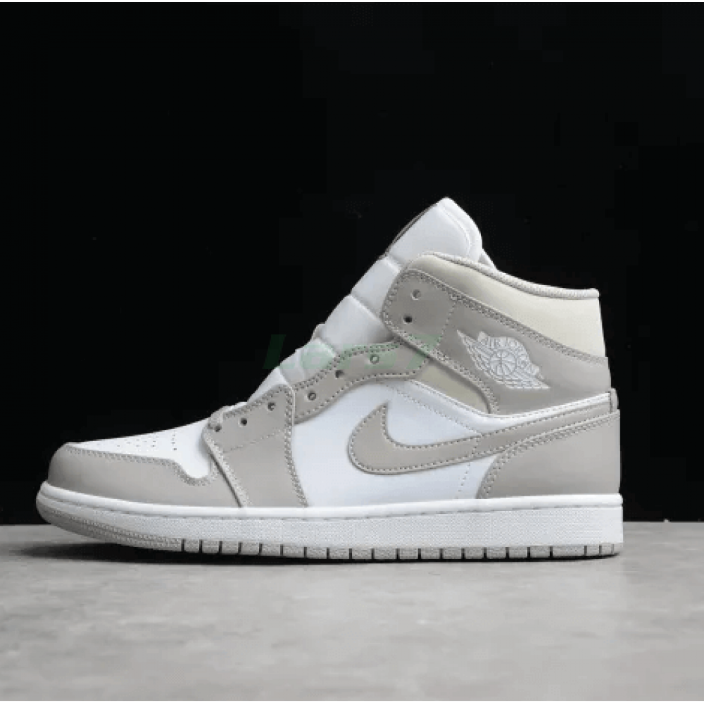 Air Jordan 1 Corte Medio Gris Universitario 