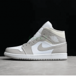 Air Jordan 1 Corte Medio Gris Universitario 