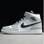 Air Jordan 1 Corte Medio Gris